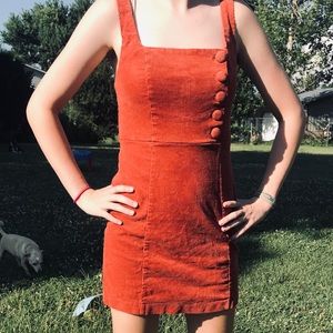 Orange corduroy dress with buttons